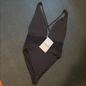 Black one piece swim suit by Naked Wardrobe